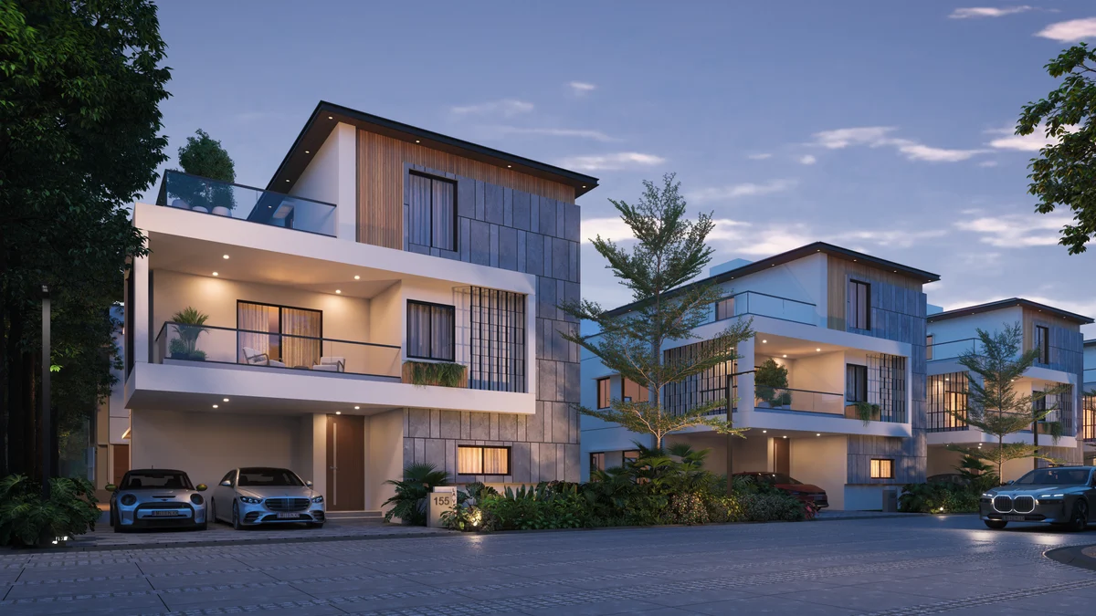 Revasa Là Valora G+2 villas at dusk with stone-clad and timber-slatted facades, glazed balconies and parking at the front of each plot Revasa Là Valora G+2 villas at dusk with stone-clad and timber-slatted facades, glazed balconies and parking at the front of each plot
